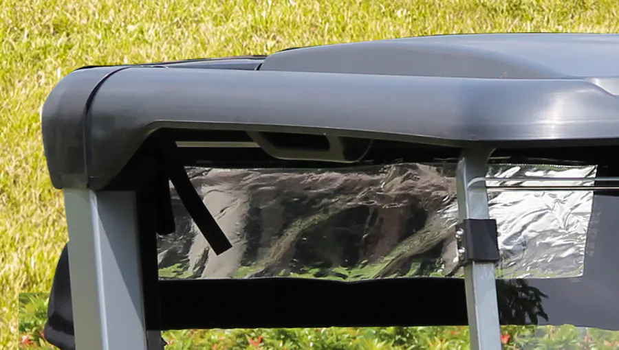 Close-up of heavy-duty injection molded canopy on Tara golf cart, designed to provide robust protection from sun and rain