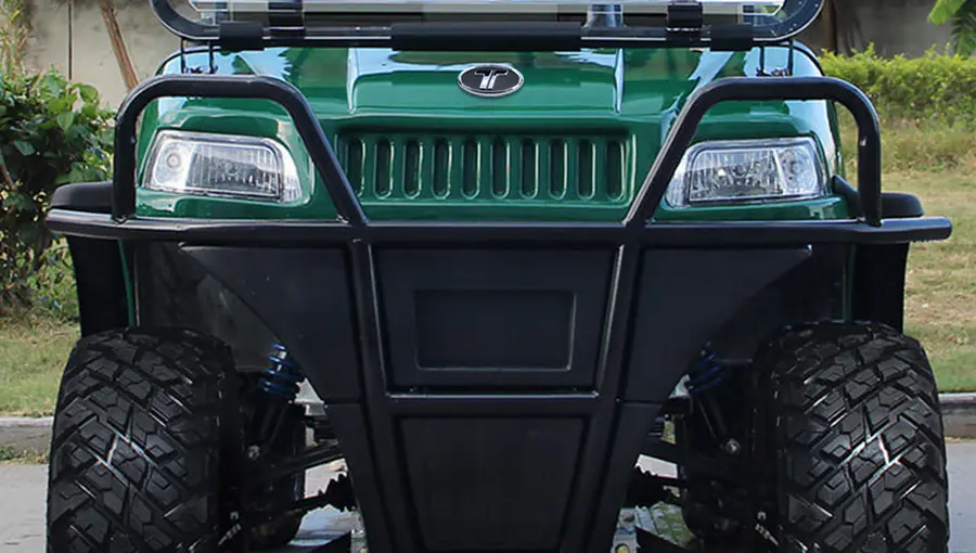 Close-up of the heavy-duty front bumper on Tara Turfman 700, designed to protect the vehicle during rugged use